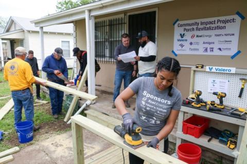Volunteers building home access ramp during Amarillo community service project