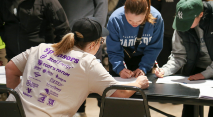 Community volunteers signing up to support Amarillo families through United Way initiatives.